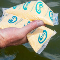 Waste Sludge Reducer wastewater lagoon bio-enzymes and septic system bio-enzymes bags ready to add to pond
